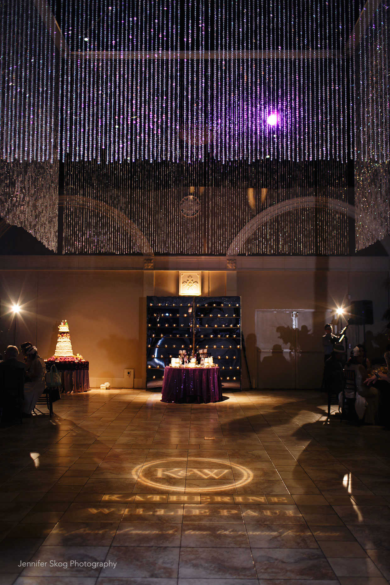 Gorgeous chandelier and reception at Casa Real at Ruby Hill Winery (www.casarealevents.com).  Photo by: Jennifer Skog Photography;  Florals and Design: Asiel Design;  Lighting: Fantasy Sound Event Services;  Linens: Napa Valley Linens